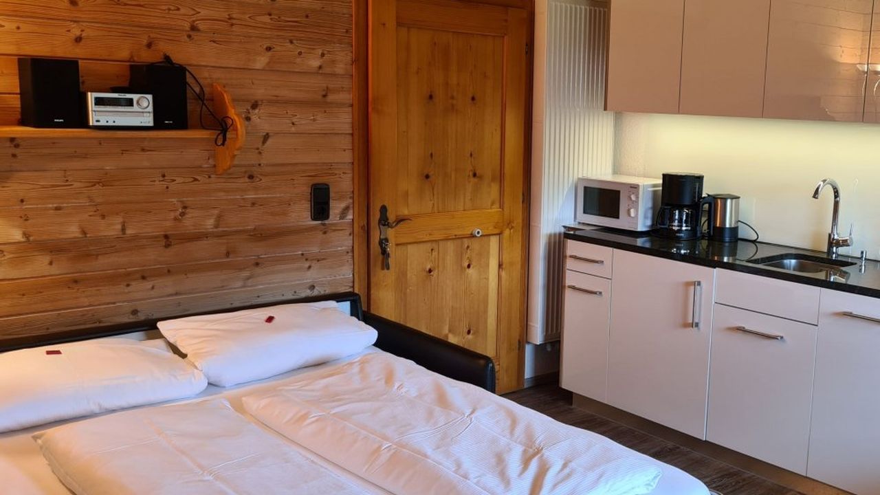 Wohnküche mit ausgezogenem Schlafsofa Bauernhaus 5 Wohnküche mit ausgezogenem Schlafsofa Bauernhaus 5